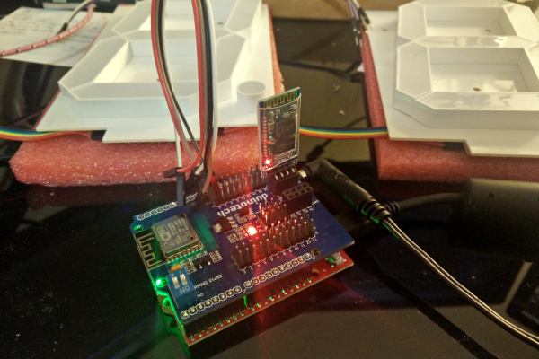Arduino, ESP, and bluetooth serial adapter attached together